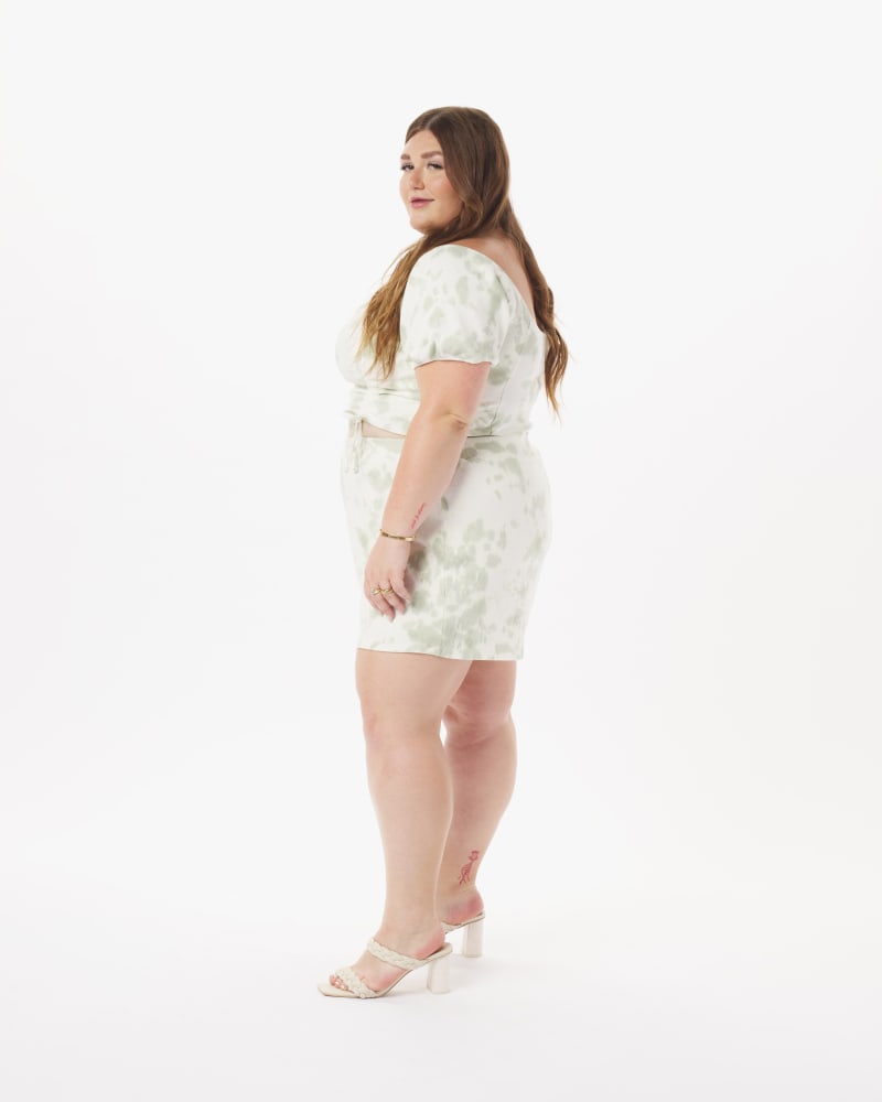 Side of a model wearing a size 5X Bo Top in Sky Blue in Sage Green by What Lo Wants. | dia_product_style_image_id:237973